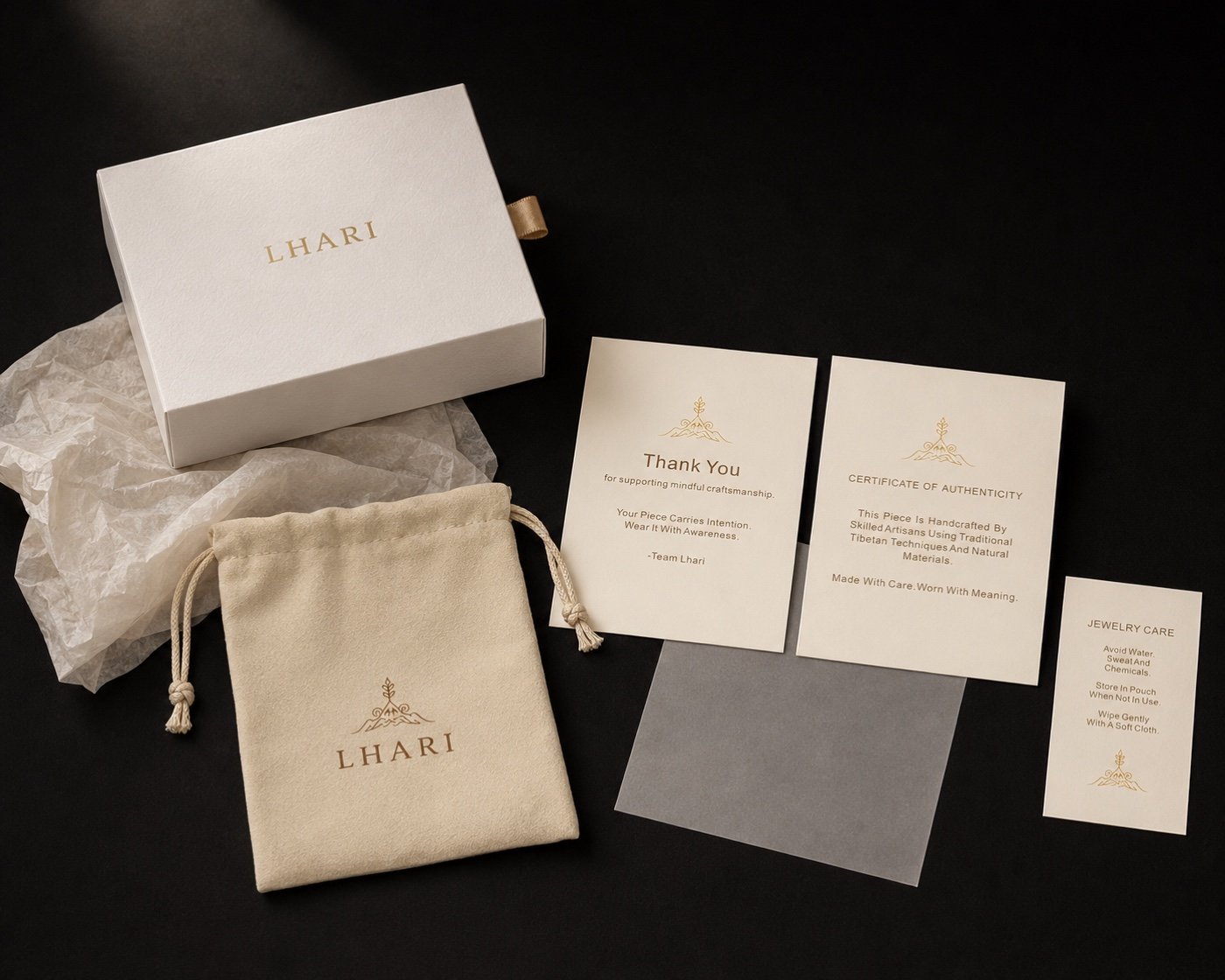 LHARI presentation packaging with jewelry box, protective pouch and care materials