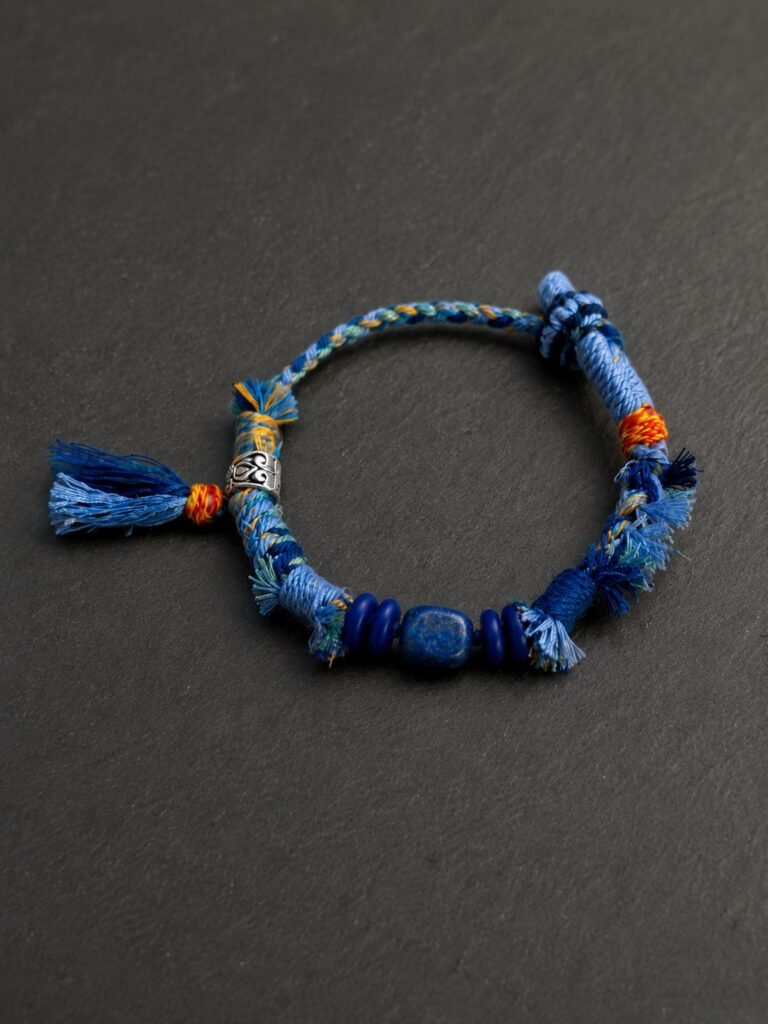 LHARI Blue Kora Protection Bracelet black background 45-degree view