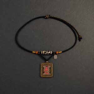 LHARI The Dzi Reliquary black background overhead view